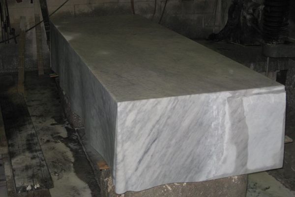 Carving the table cloth from the large piece of Italian Carrara marble.