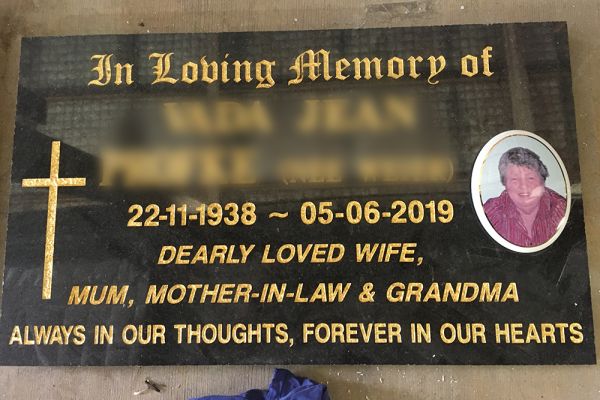 Another beautiful example of a plaque made from Australian Imperial black granite. It has been finished  with a gold incised inscription, cross and a porcelain portrait.