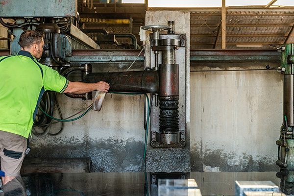 A T. Wrafter & Sons stonemason working in the Brisbane factory.