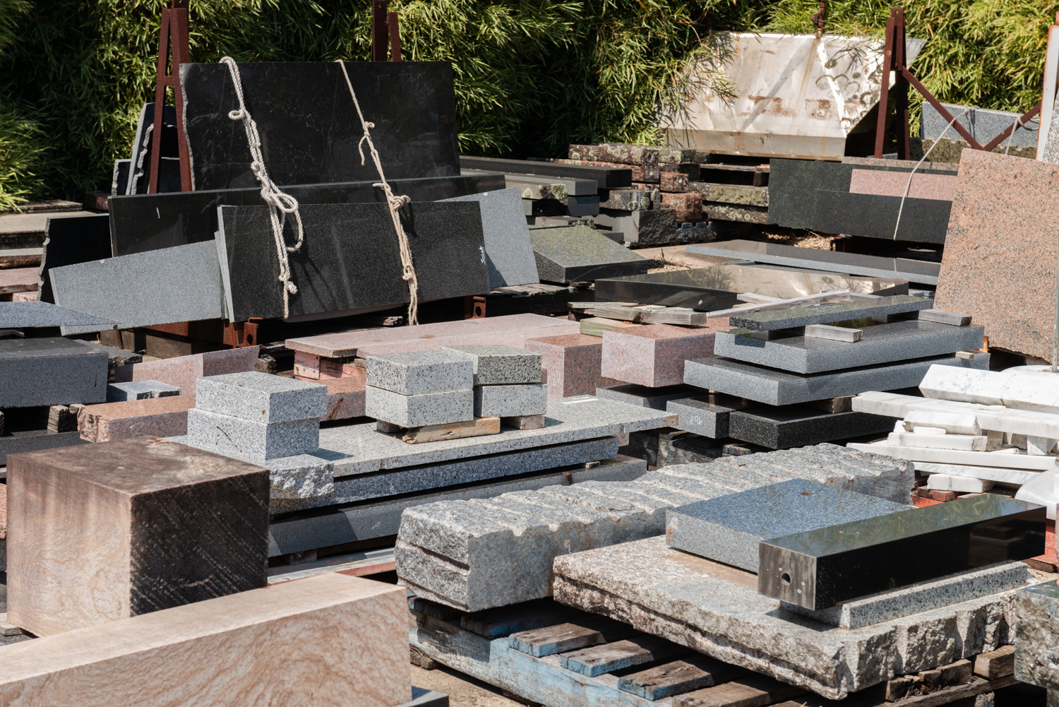 Slabs of natural stone stored at our Nudgee factory, awaiting processing or for processing to be completed.